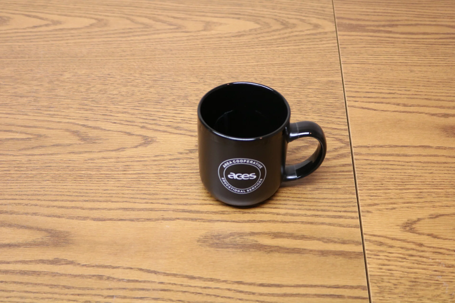 Black Mug with white ACES logo